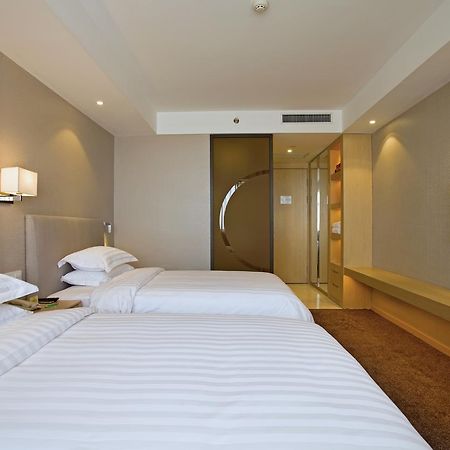 นิว ไดนาสตี้ โฮเต็ล Hotel ไคเฟิง ภายนอก รูปภาพ