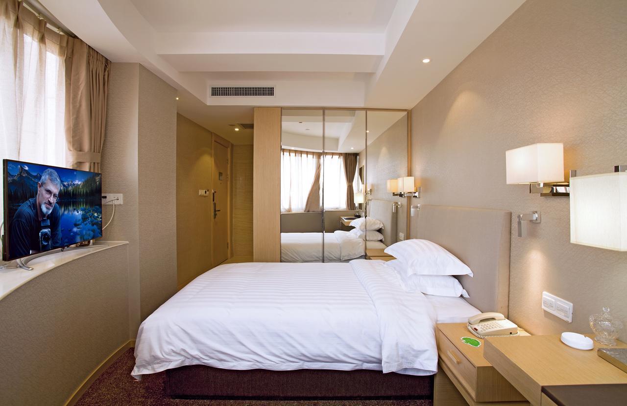 นิว ไดนาสตี้ โฮเต็ล Hotel ไคเฟิง ภายนอก รูปภาพ