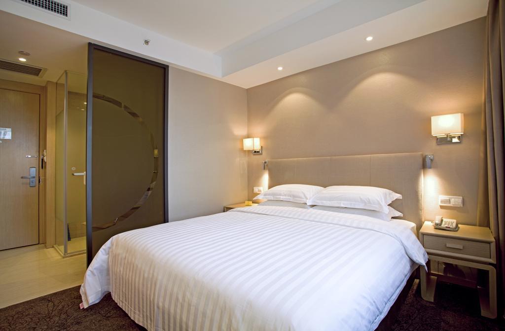 นิว ไดนาสตี้ โฮเต็ล Hotel ไคเฟิง ภายนอก รูปภาพ