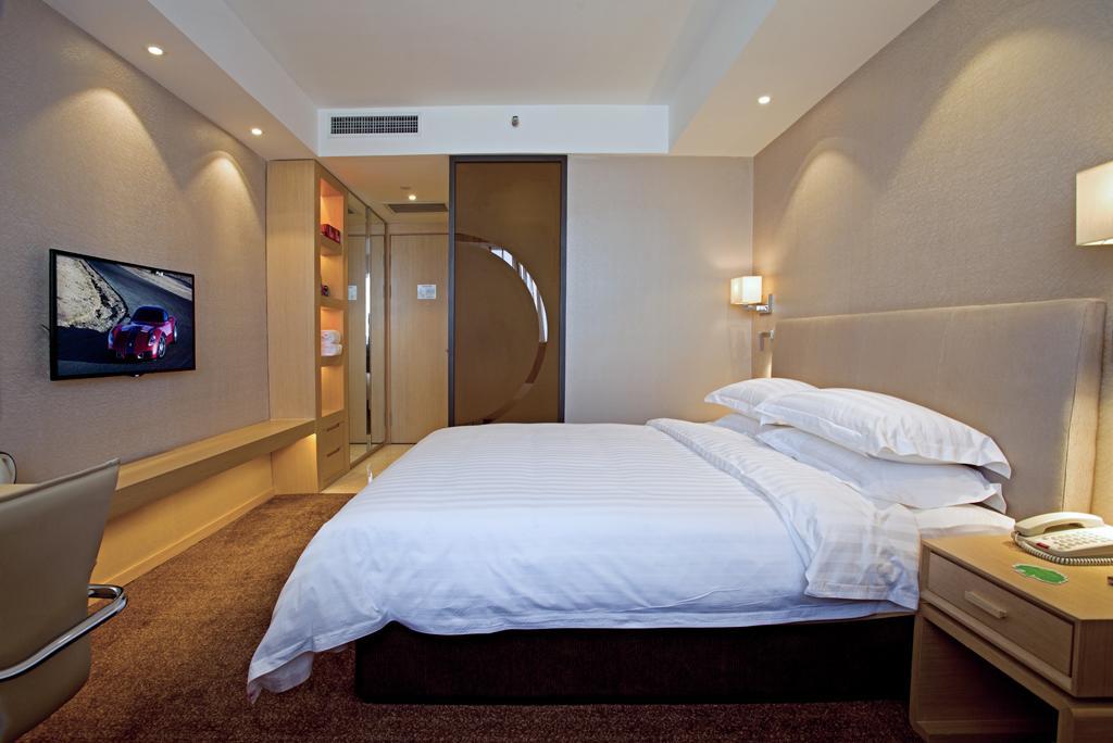 นิว ไดนาสตี้ โฮเต็ล Hotel ไคเฟิง ภายนอก รูปภาพ