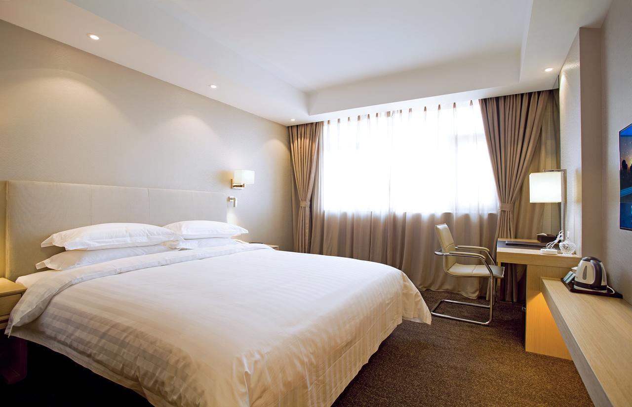 นิว ไดนาสตี้ โฮเต็ล Hotel ไคเฟิง ภายนอก รูปภาพ