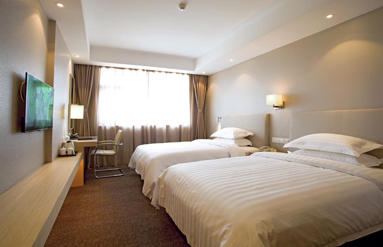 นิว ไดนาสตี้ โฮเต็ล Hotel ไคเฟิง ภายนอก รูปภาพ