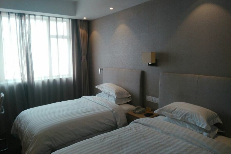 นิว ไดนาสตี้ โฮเต็ล Hotel ไคเฟิง ภายนอก รูปภาพ